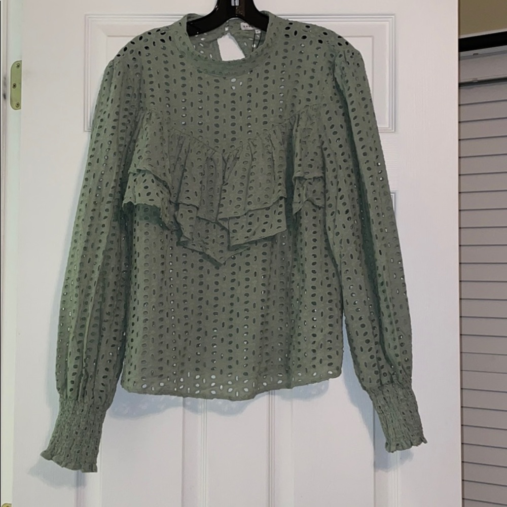 Green smocked top with cut detail